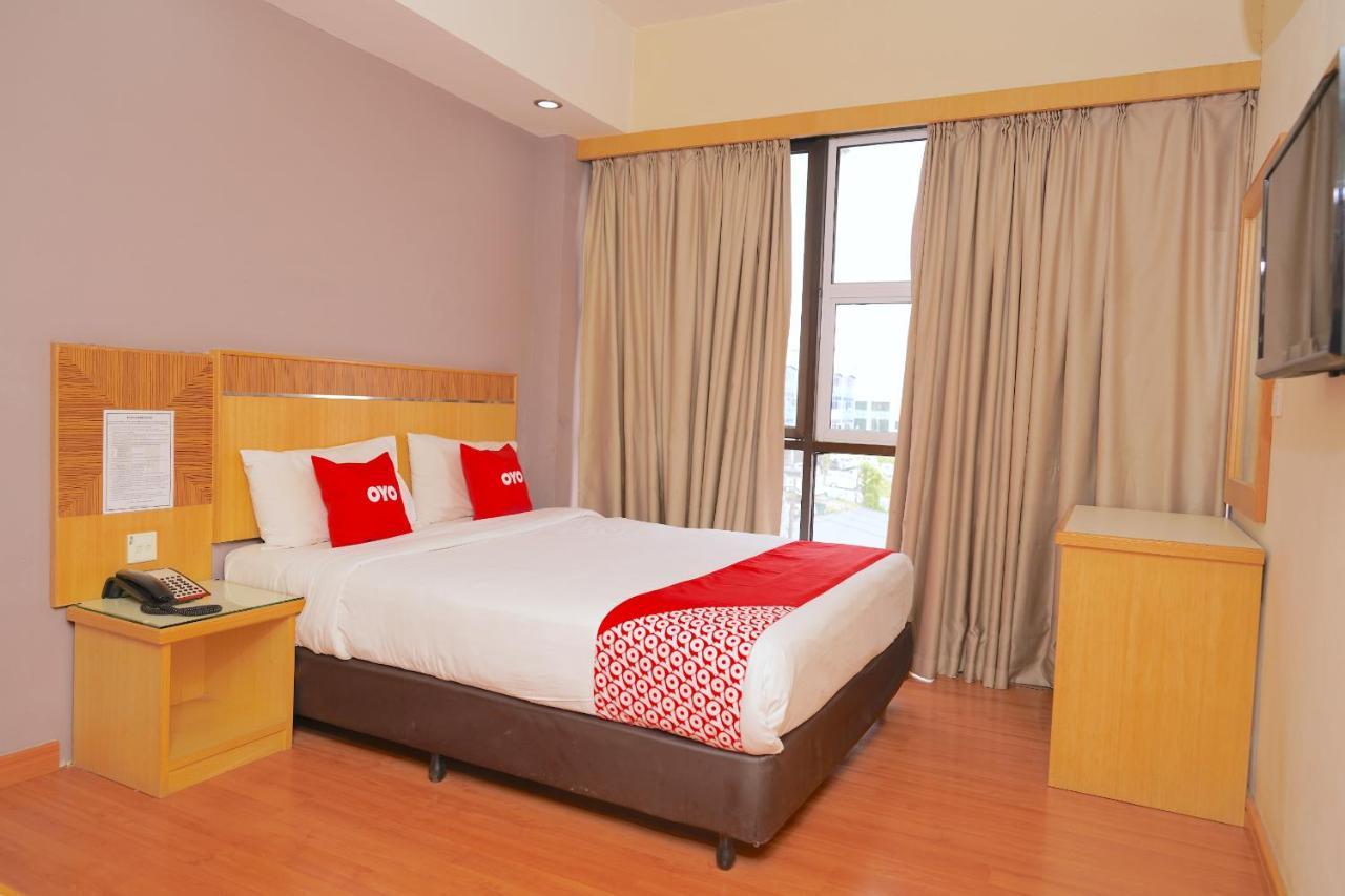 Oyo 89866 Houz Inn Bintulu Bagian luar foto